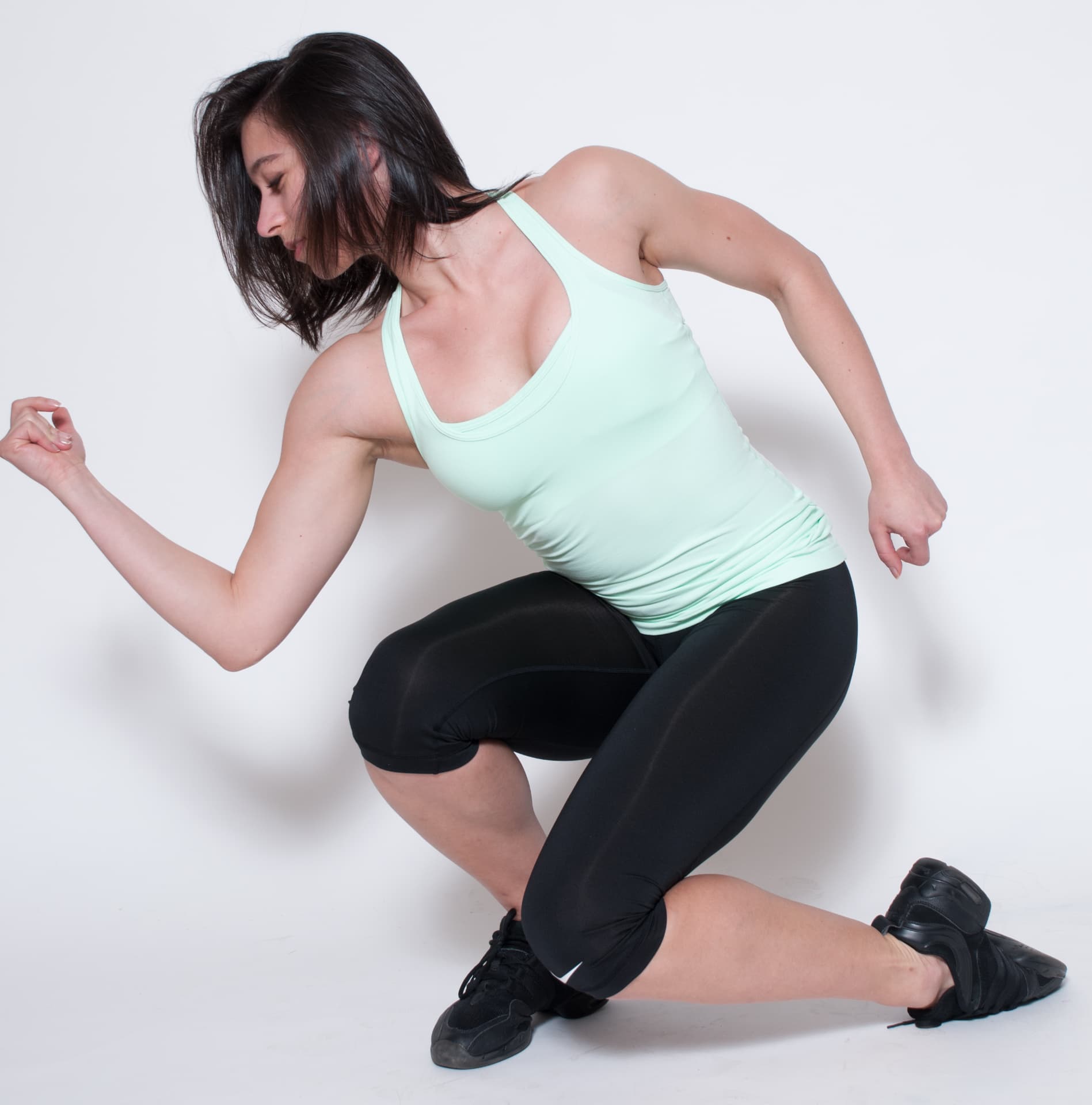 Nadya in a low athletic sprint stance